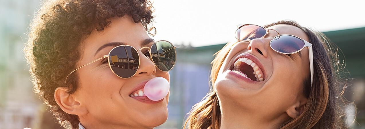 two female friends laughing together