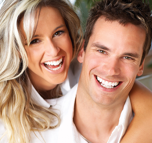 happy couple with cosmetic teeth