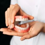 denture care, clean dentures, denture maintenance, dentures in Anderson, Edgewood Family Dentistry, Dr. Mallory Kuiper, dental hygiene for dentures, proper denture cleaning, denture soaking, oral health with dentures