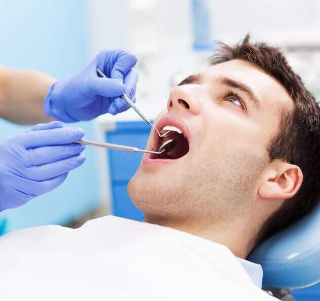 man at the dentist