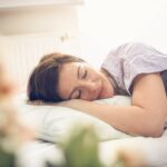 photo of woman recovering from tooth extraction