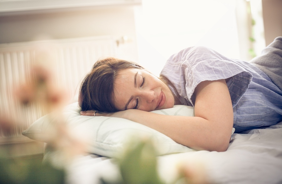 photo of woman recovering from tooth extraction