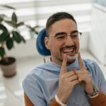 man in dental office starting invisalign treatment