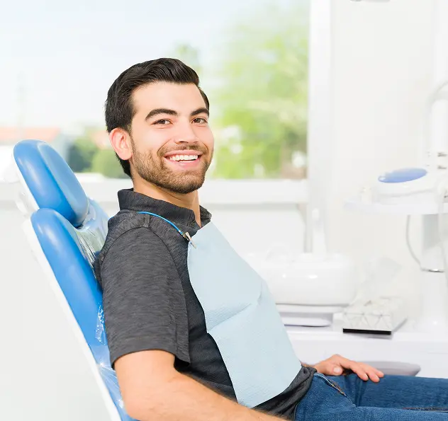 smiling man at the dentist