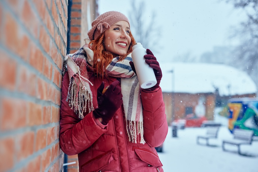 dry mouth in winter, woman drinking water in winter