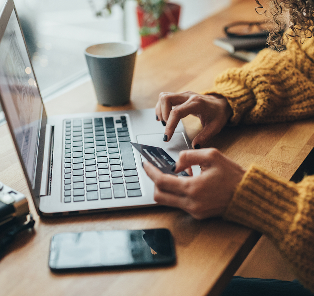 person paying bill on computer